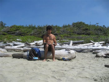 Photo shows the poet on Florencia Bay, writing these words, long ago.